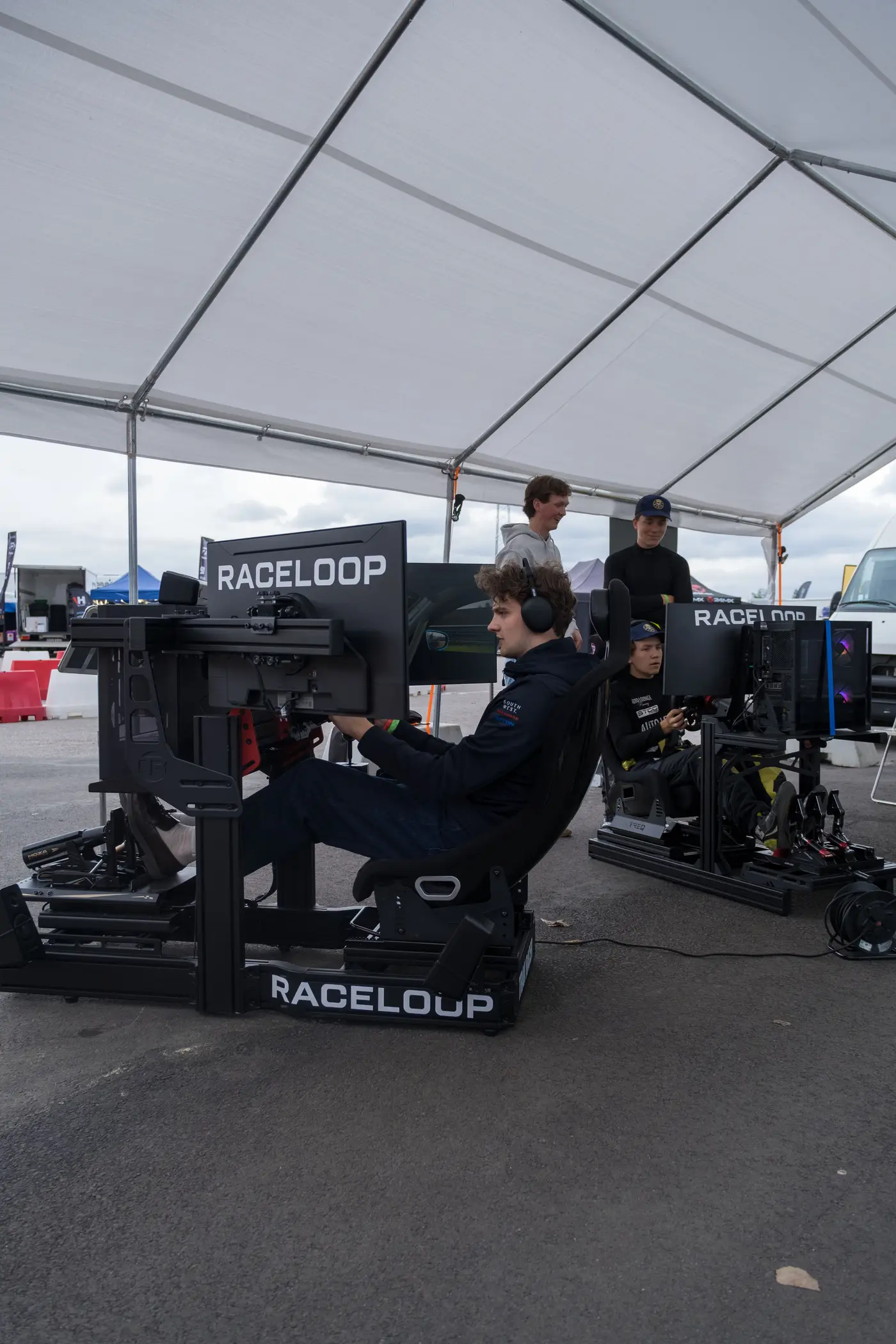 A racing simulator in your booth makes visitors register to drive, not to win a giveaway. You get name, email and a natural conversation opener with every driver.